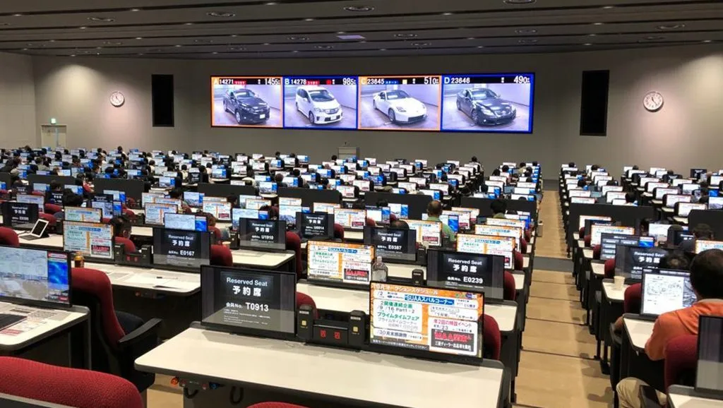 Cars lined up at a Japanese car auction