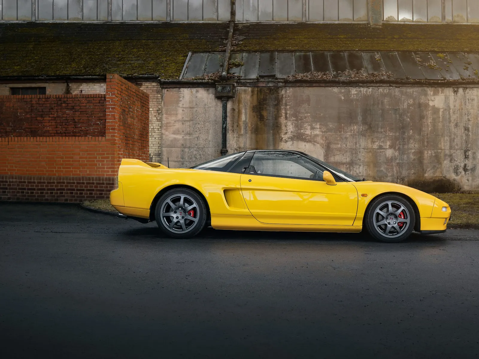 A yellow Honda NSX