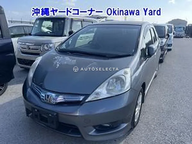 Honda Fit Shuttle Hybrid 2011, auction grade RA