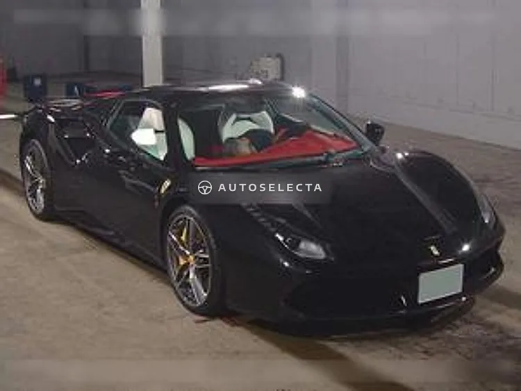 Interior of a 2017 Ferrari 488 Spider with white leather seats, red dashboard and red carpets