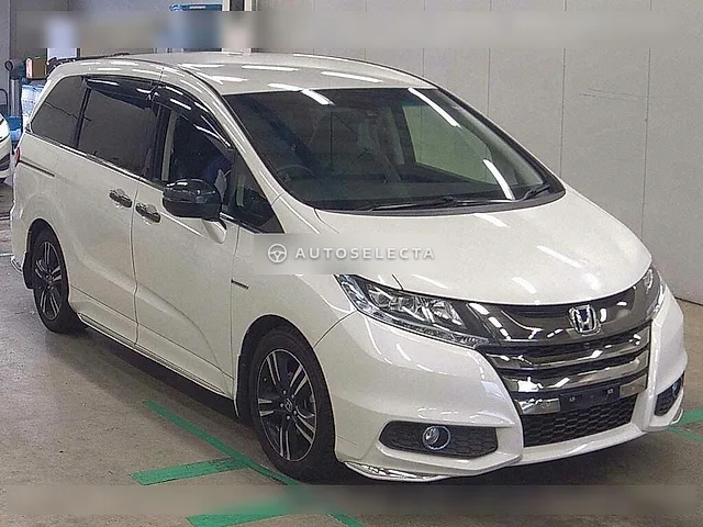 Honda Odyssey Hybrid 2016, auction grade 3.5