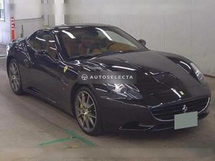 Black 2010 Ferrari California front three quarter view with grey alloy wheels at USS Tokyo