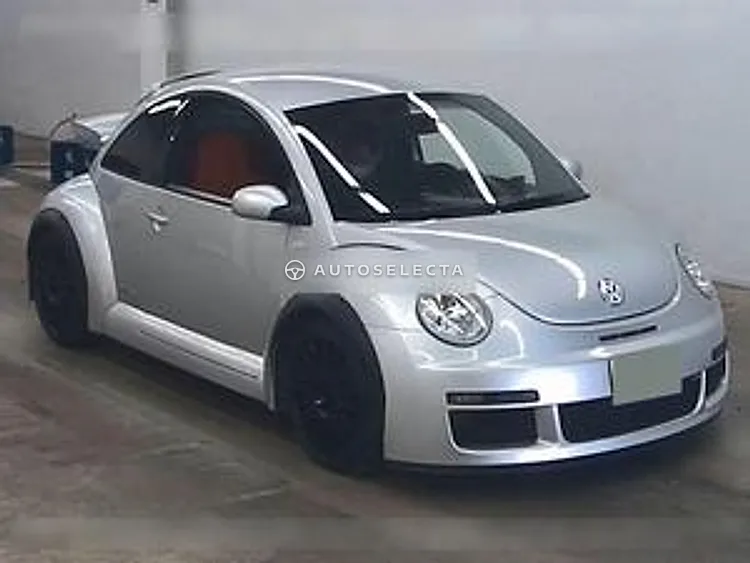 Silver 2001 Volkswagen New Beetle RSi front three quarter view with wide arches and black OZ wheels at USS Tohoku