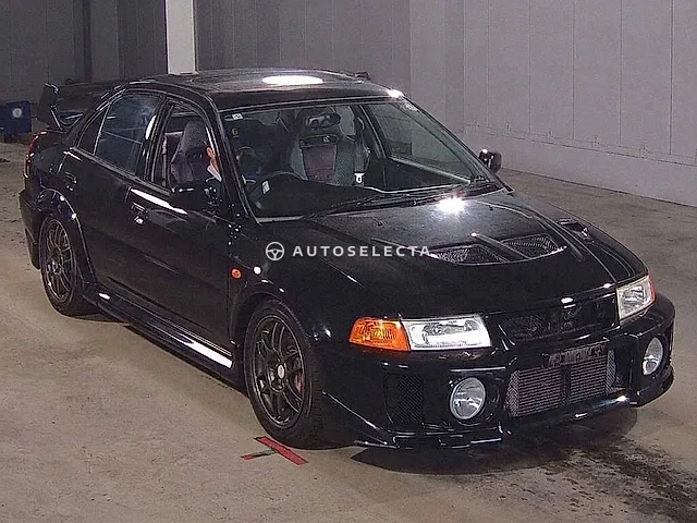 Mitsubishi Lancer 1998, auction grade 4